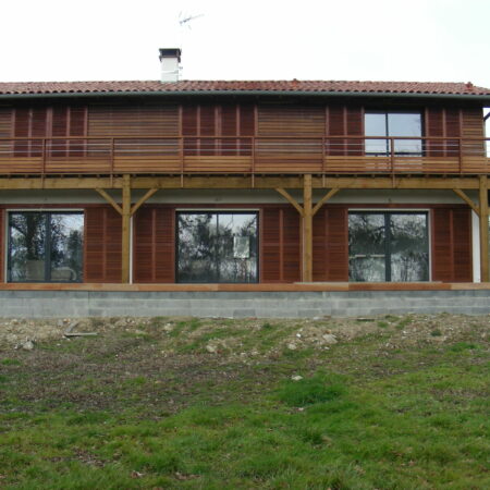 Maison en bois avec Volets Guignard.